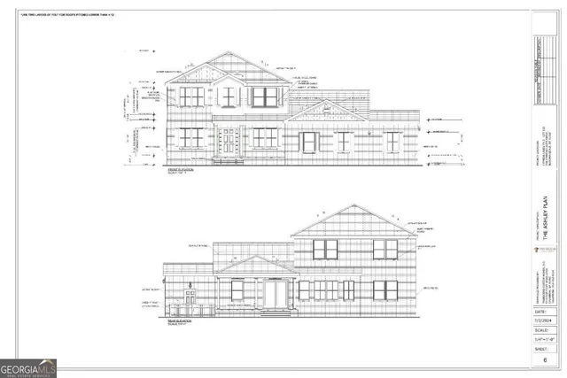 a black and white photo of a large building