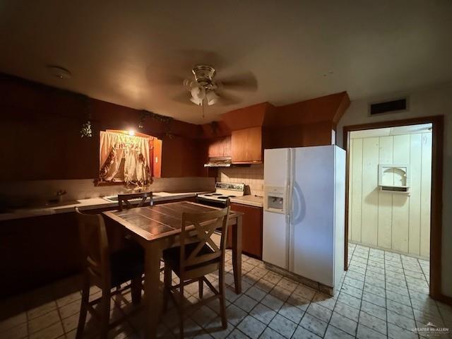 1606 North Grant Street Roma, TX 78584 - Photo 11 of 16 a kitchen with refrigerator and cabinets