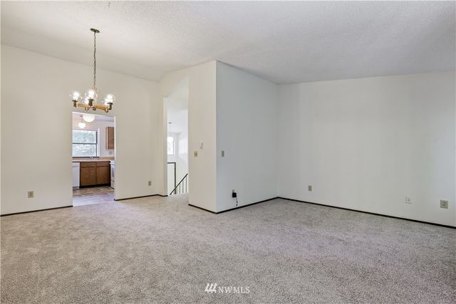 a view of a room with windows