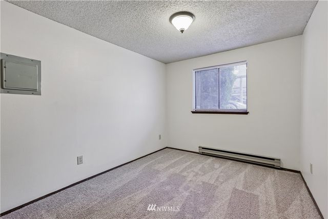 a balcony with trees in front of it