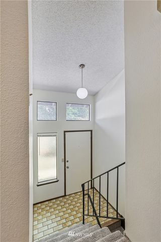 a view of entryway with wooden floor