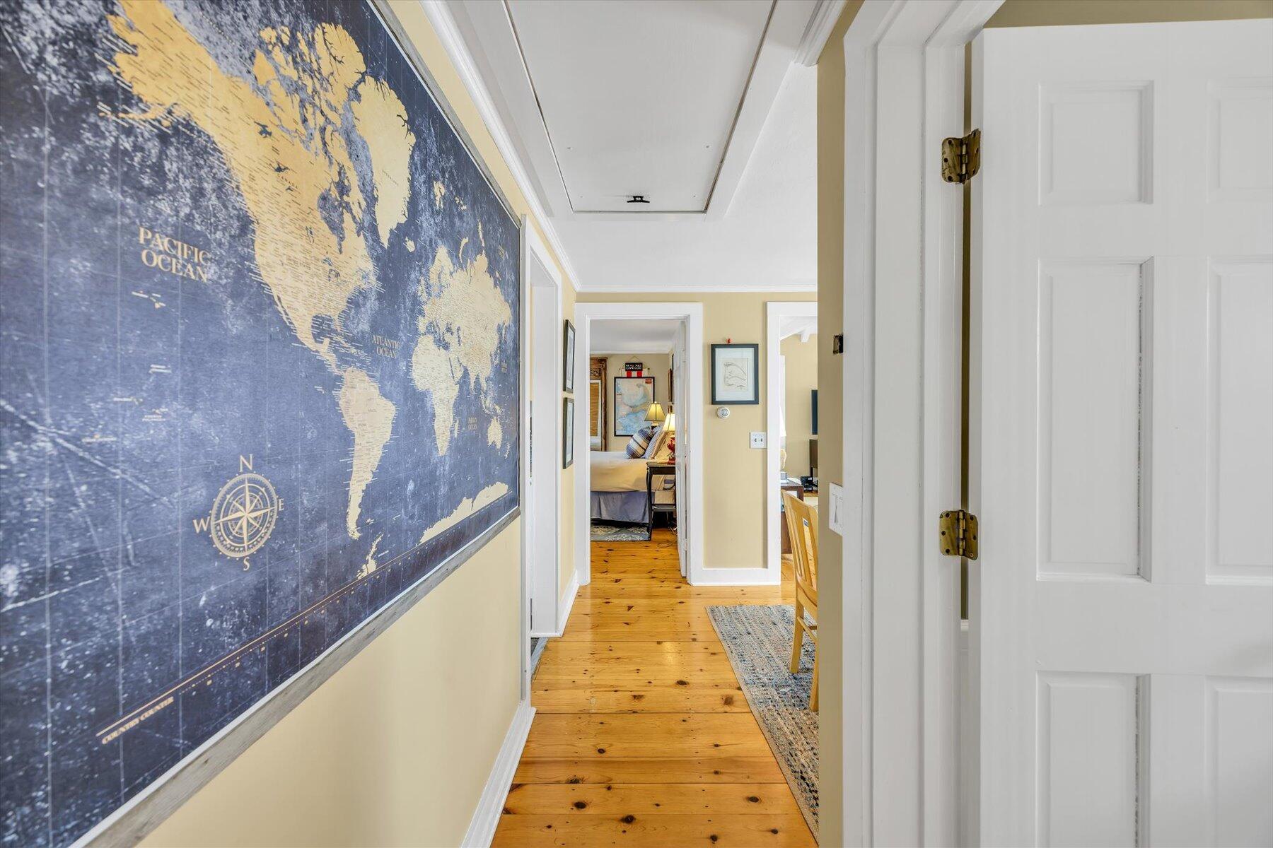 15 Cottage Street, Unit 2 Provincetown, MA 02657 - Photo 15 of 27 a view of a hallway with wooden floor and staircase
