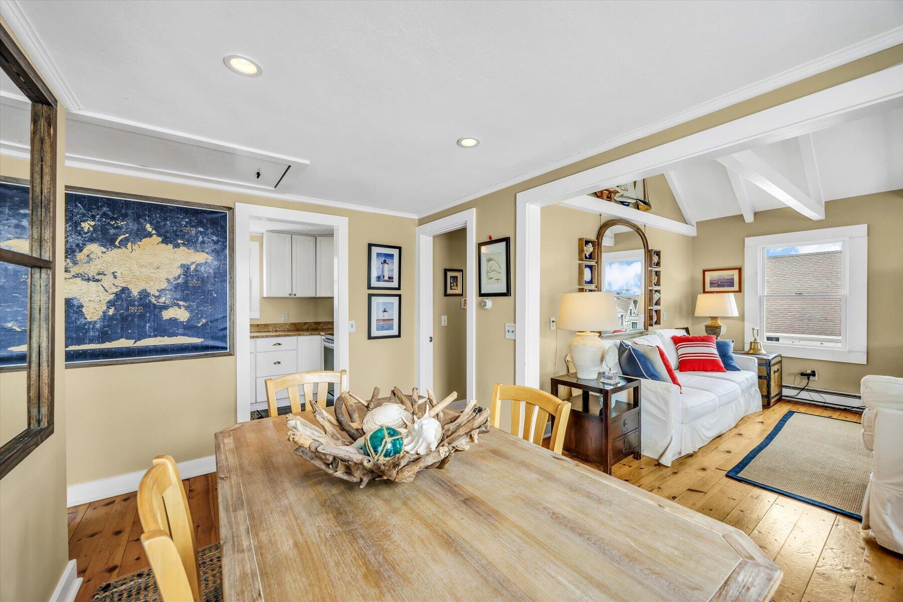 15 Cottage Street, Unit 2 Provincetown, MA 02657 - Photo 8 of 27 a living room with furniture and wooden floor