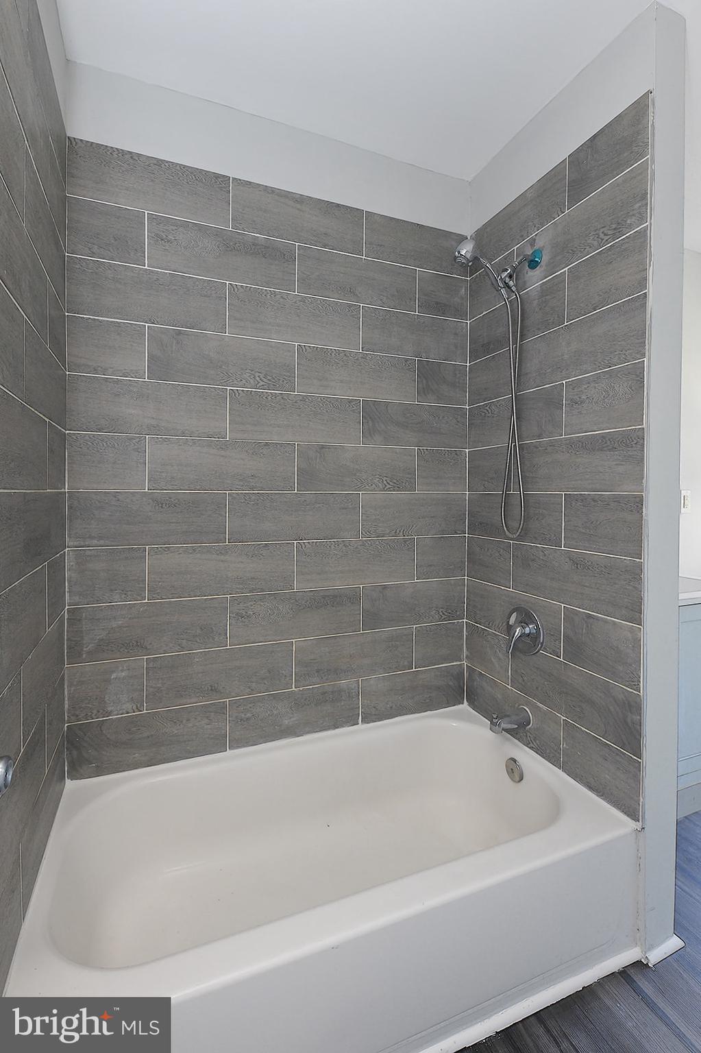 1037 Edmondson Avenue, Unit 2 Baltimore, MD 21223 - Photo 10 of 14 Bathroom tub/shower