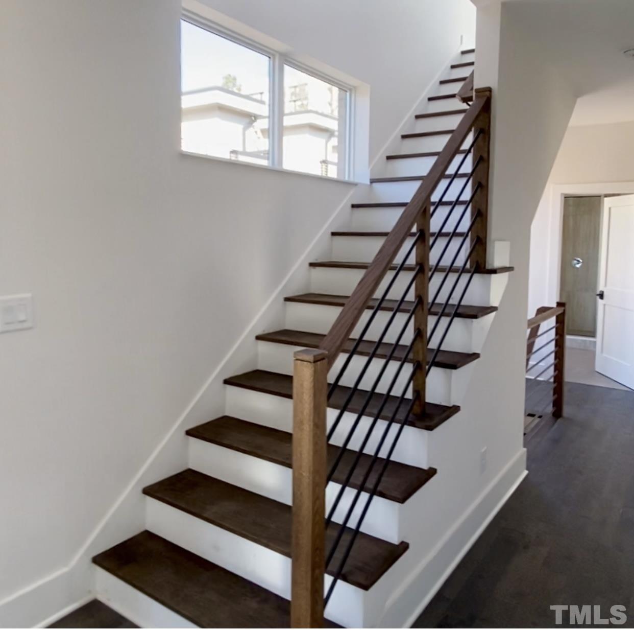 1026 Manor Way Durham, NC 27701 - Photo 20 of 24 a view of entryway and hall with wooden floor