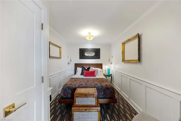 a bed room with bed and a night stand