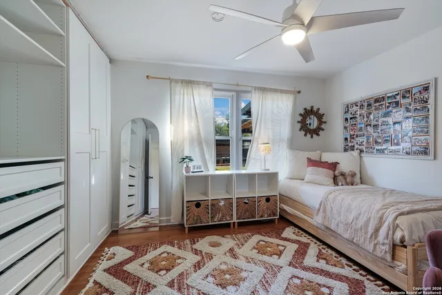 a room with a bed and a window