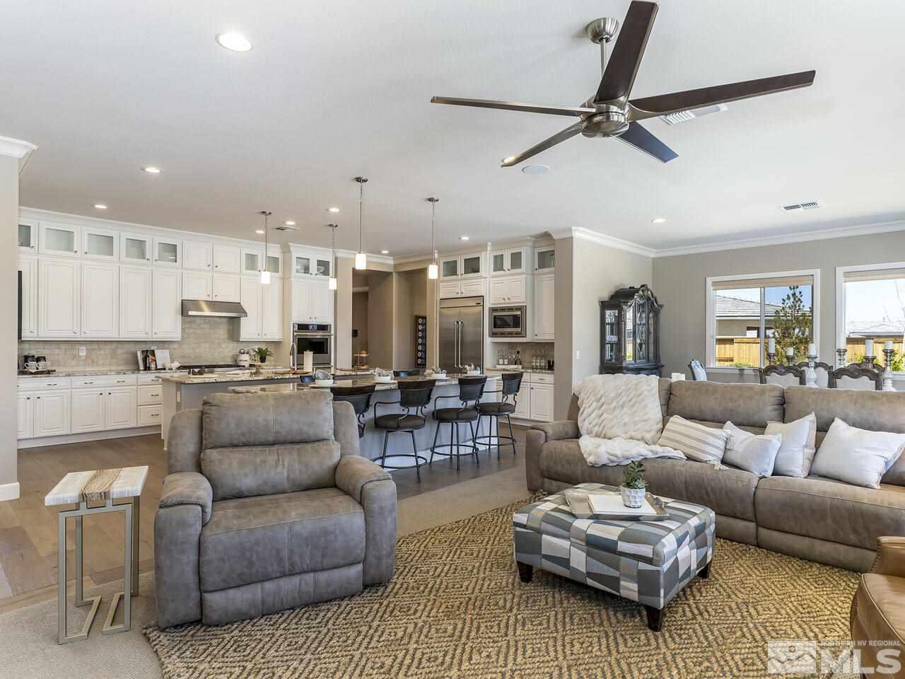 2913 Miramis Court Reno, NV 89521 - Photo 11 of 40 a living room with furniture and a view of kitchen