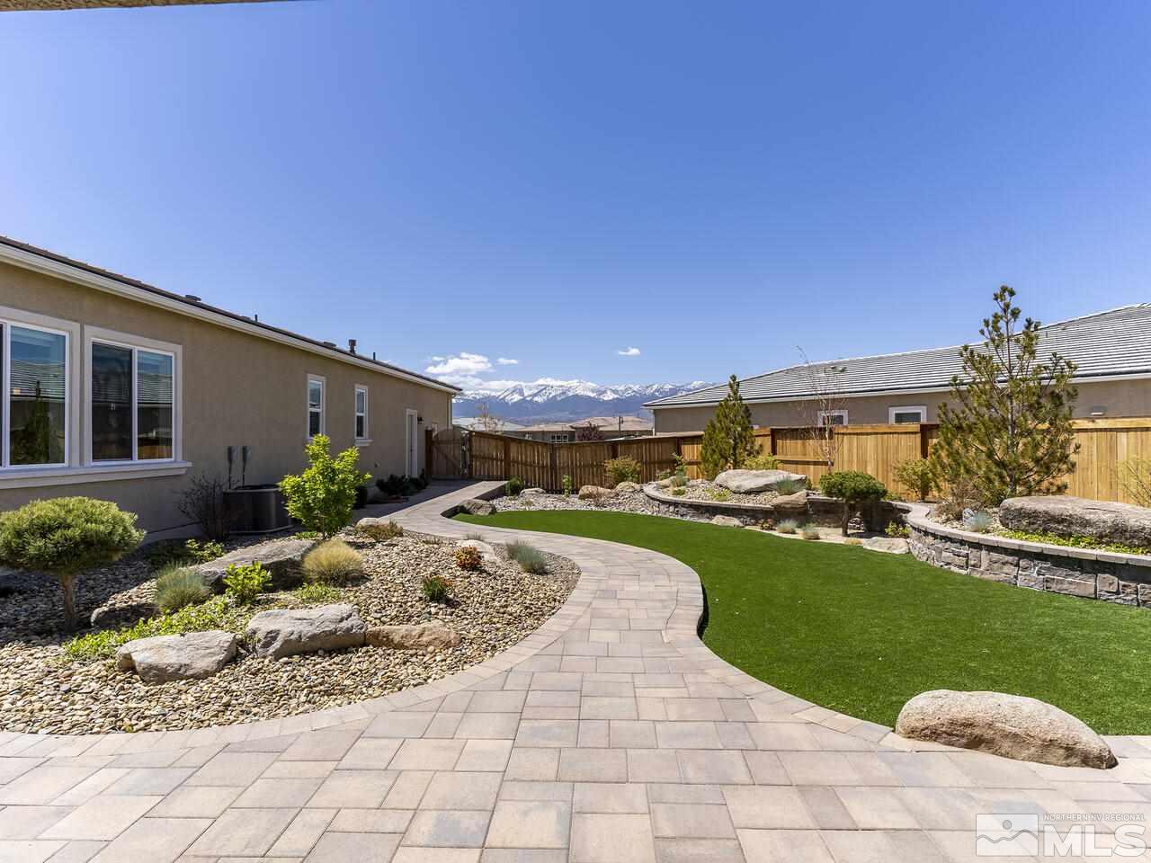 2913 Miramis Court Reno, NV 89521 - Photo 32 of 40 a view of a house with backyard porch and sitting area