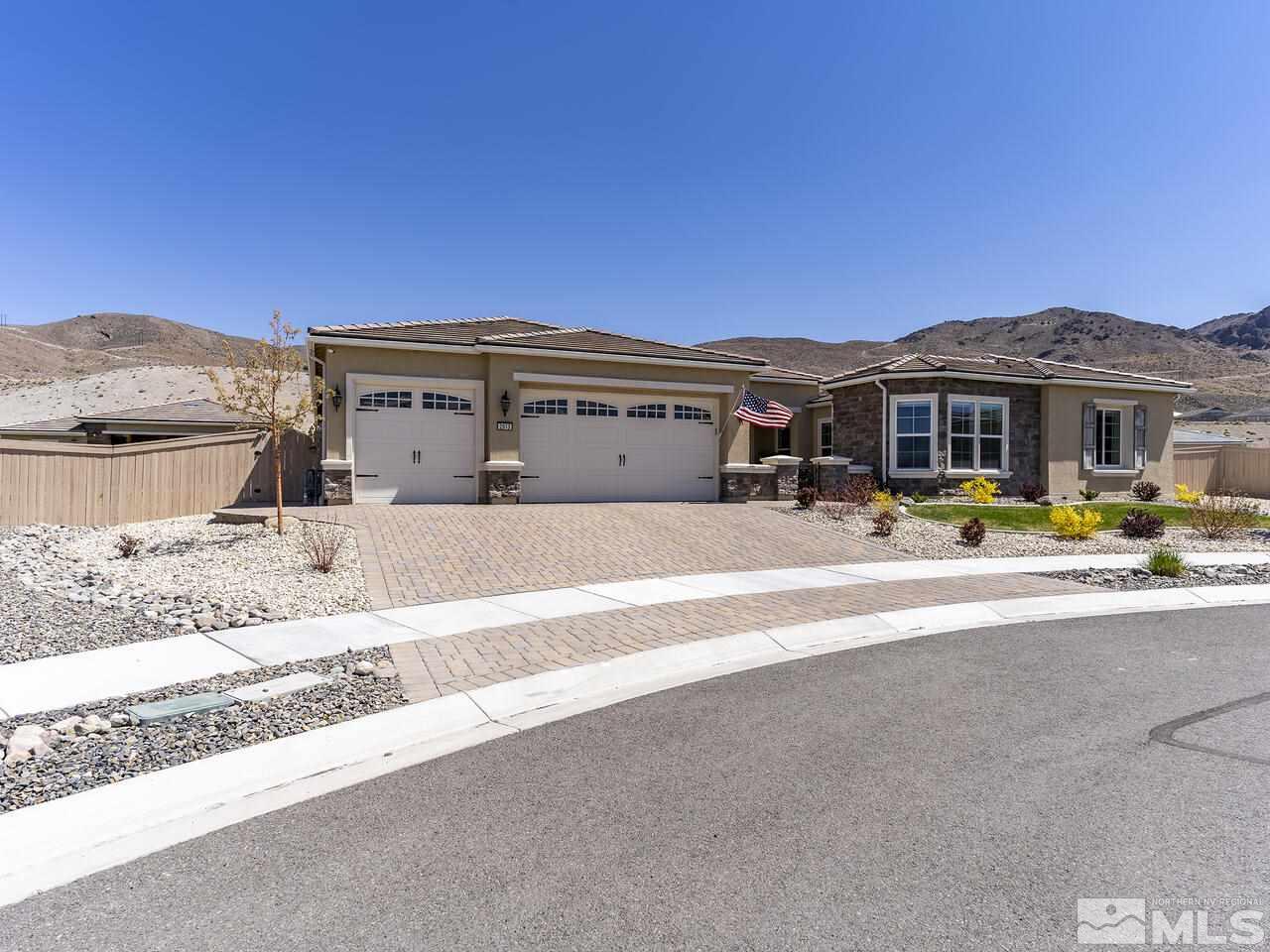 2913 Miramis Court Reno, NV 89521 - Photo 40 of 40 a front view of a house with a fountain and a yard