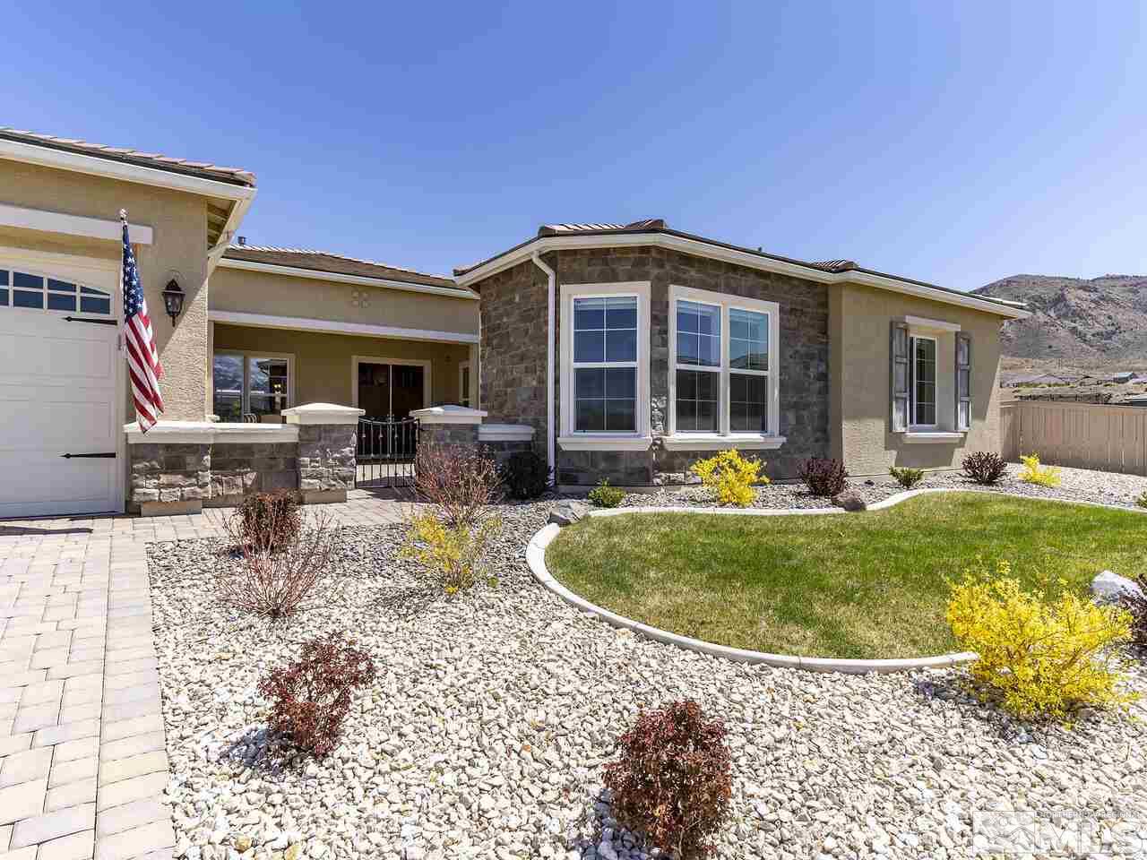 2913 Miramis Court Reno, NV 89521 - Photo 5 of 40 a view of a house with backyard sitting area and swimming pool
