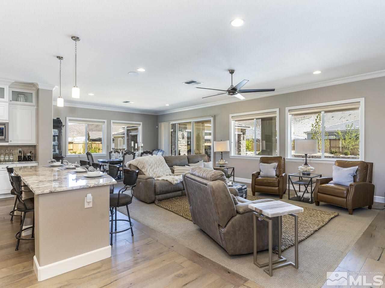 2913 Miramis Court Reno, NV 89521 - Photo 8 of 40 a living room with furniture kitchen view and a large window