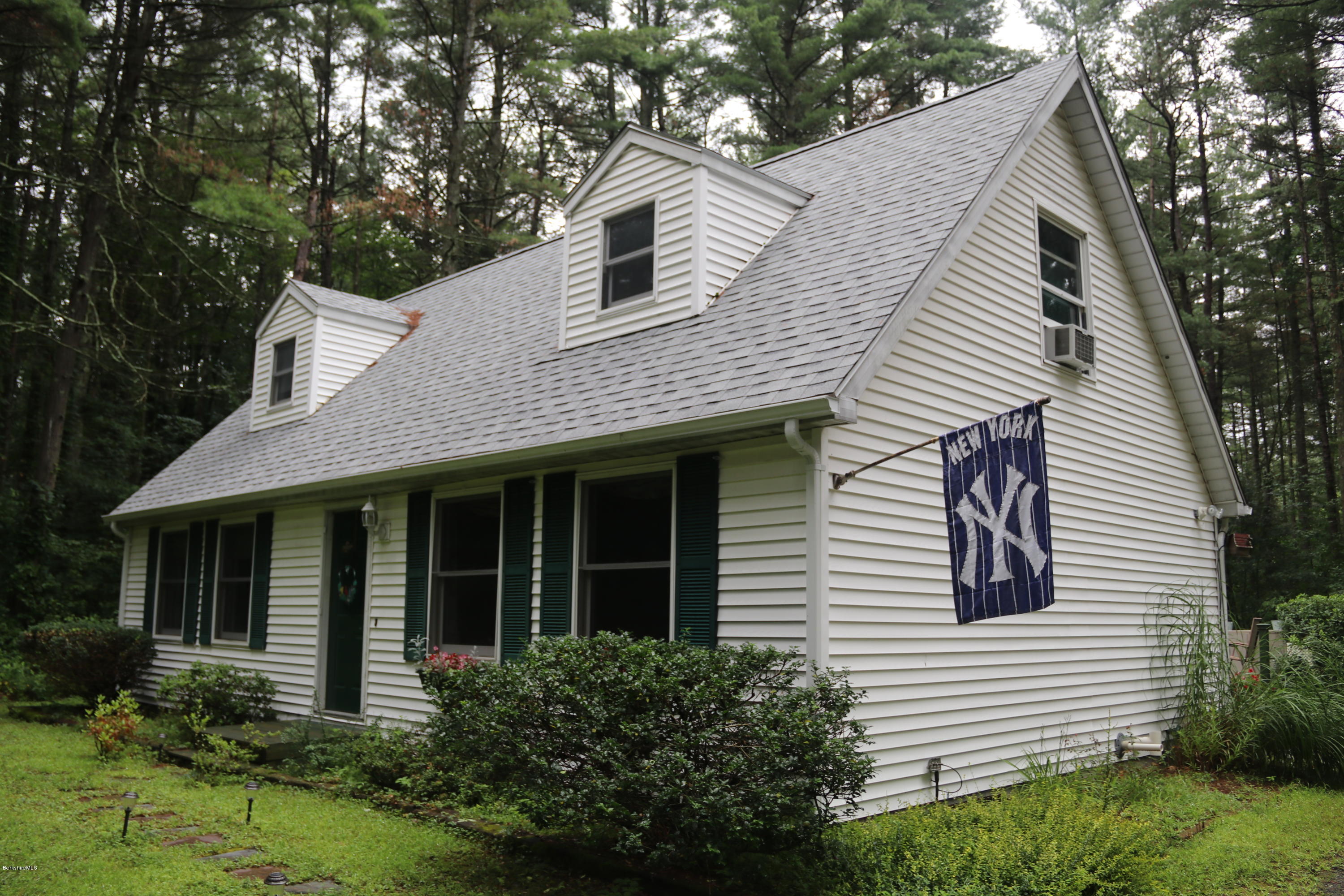 503 Polikoff Road Sheffield, MA 01222 - Photo 4 of 25 a view of house with a yard and potted plants