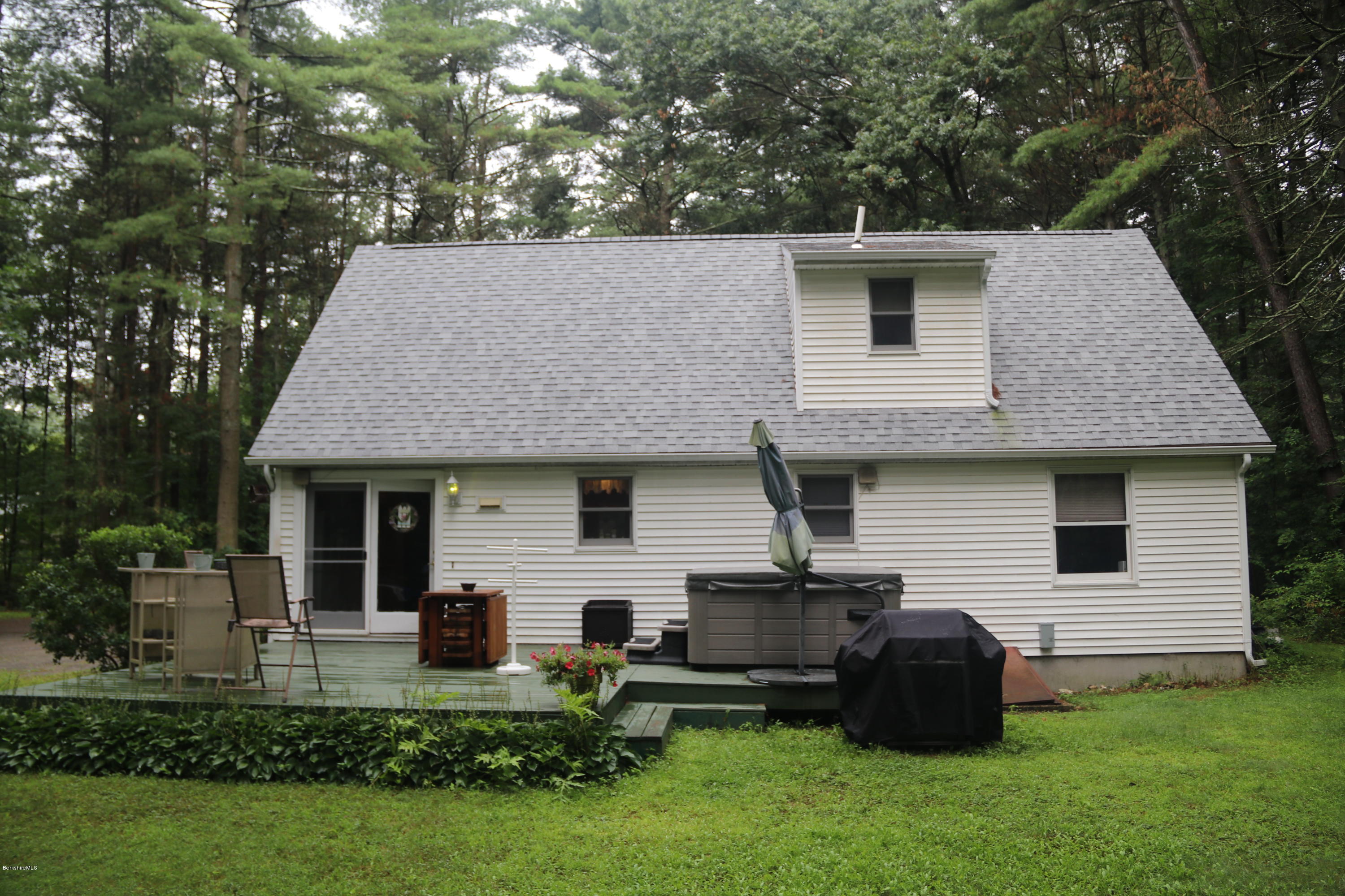 503 Polikoff Road Sheffield, MA 01222 - Photo 7 of 25 a front view of a house with a garden