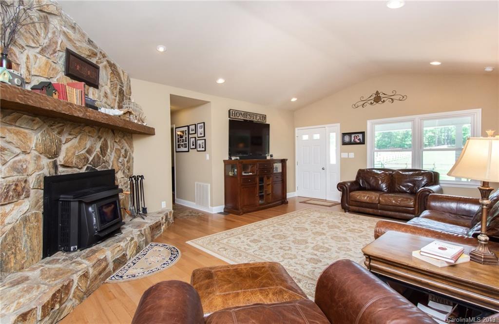 314 Steel Hill Road Lancaster, SC 29720 - Photo 11 of 47 a living room with furniture and a fireplace