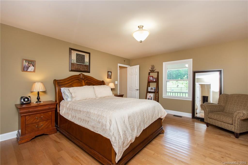 314 Steel Hill Road Lancaster, SC 29720 - Photo 13 of 47 a bedroom with a bed and a couch