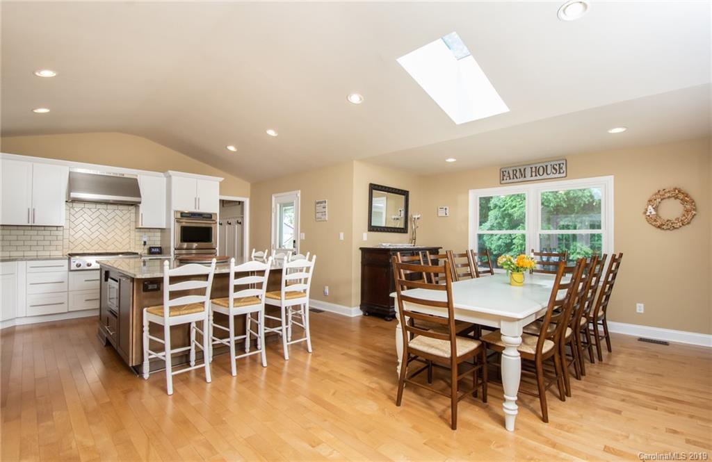 314 Steel Hill Road Lancaster, SC 29720 - Photo 22 of 47 a view of a dining room with furniture window and wooden floor