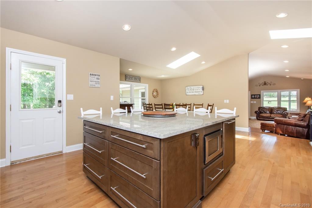 314 Steel Hill Road Lancaster, SC 29720 - Photo 24 of 47 a kitchen with a stove and a sink