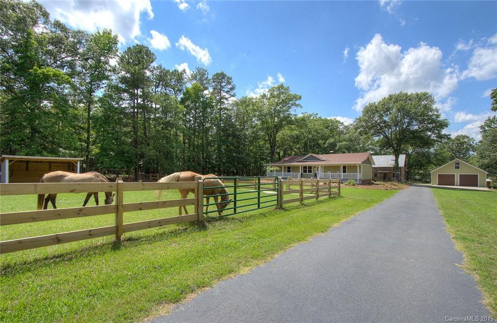 314 Steel Hill Road Lancaster, SC 29720 - Photo 4 of 47 a view of a house with a yard