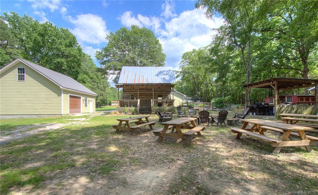 314 Steel Hill Road Lancaster, SC 29720 - Photo 40 of 47 a view of a house with backyard and sitting area