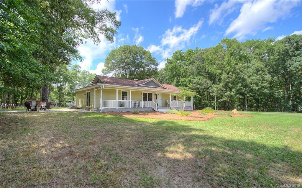 314 Steel Hill Road Lancaster, SC 29720 - Photo 7 of 47 a front view of a house with a yard
