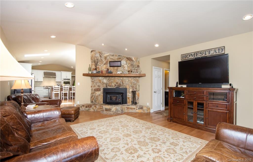 314 Steel Hill Road Lancaster, SC 29720 - Photo 10 of 47 a living room with furniture and a flat screen tv