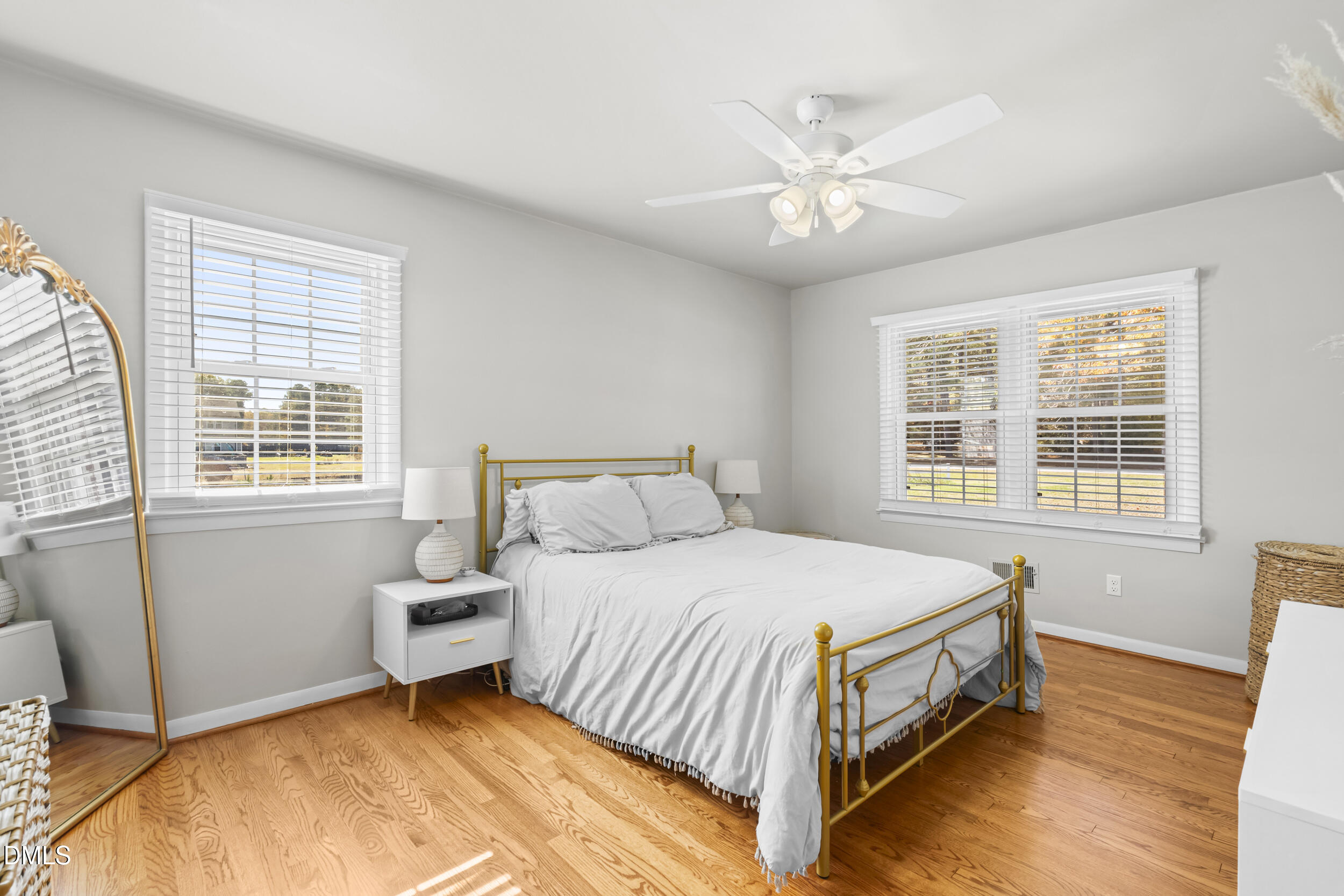 3032 Rosinburg Road Zebulon, NC 27597 - Photo 20 of 28 a bedroom with a bed and window