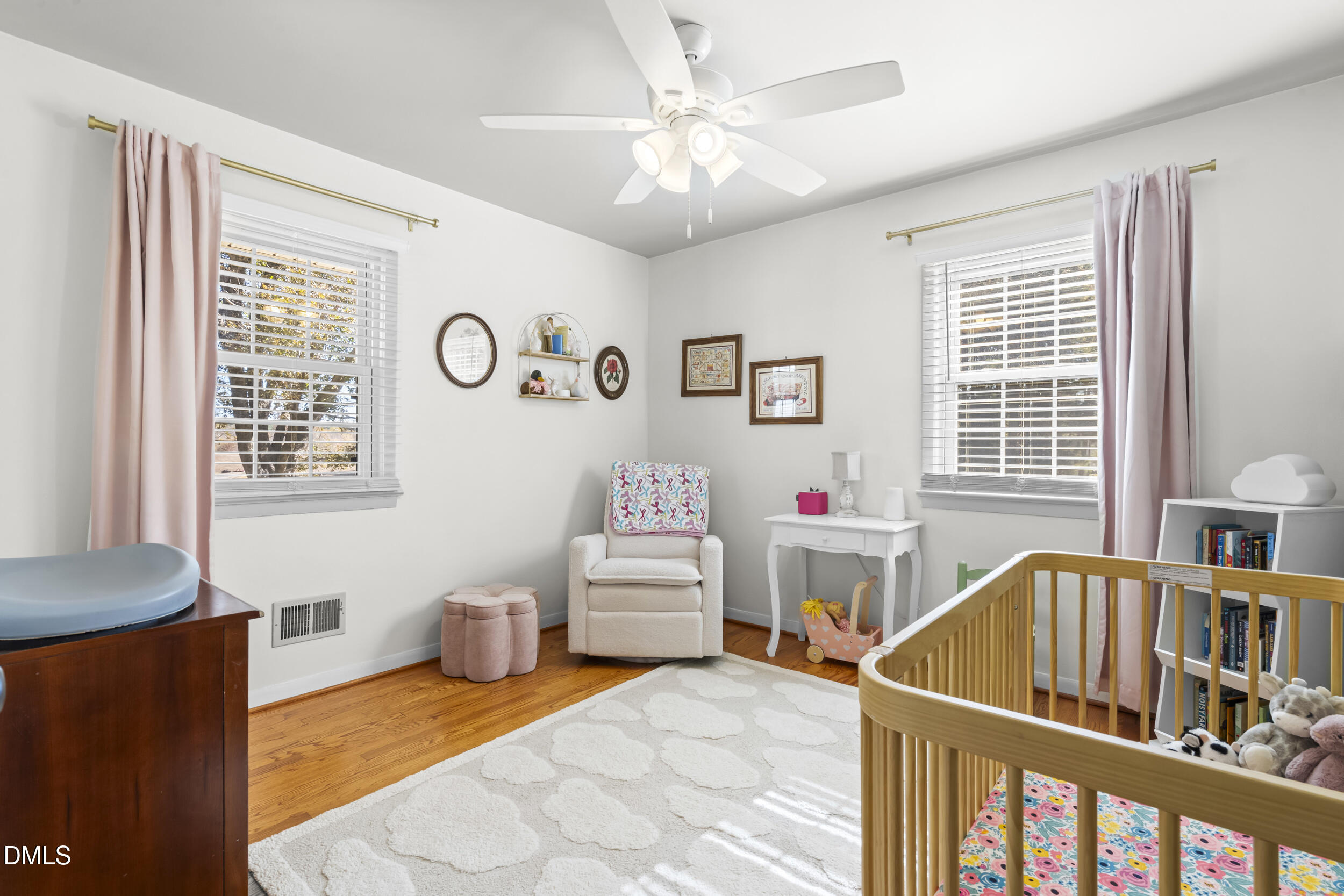 3032 Rosinburg Road Zebulon, NC 27597 - Photo 22 of 28 a bedroom with furniture and a window