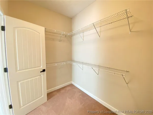 a view of a room with racks on the wall