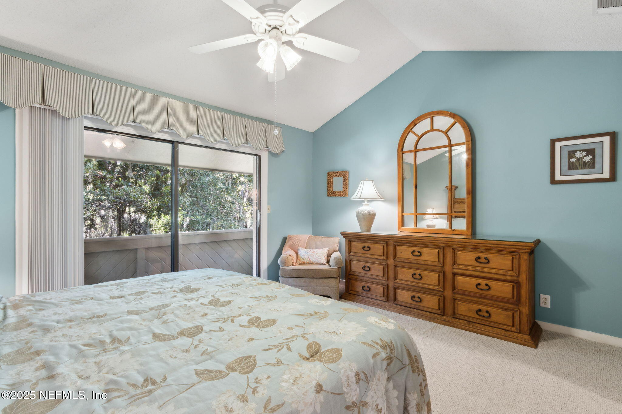 3028 Sea Marsh Road Fernandina Beach, FL 32034 - Photo 15 of 39 a bedroom with a bed and a dresser