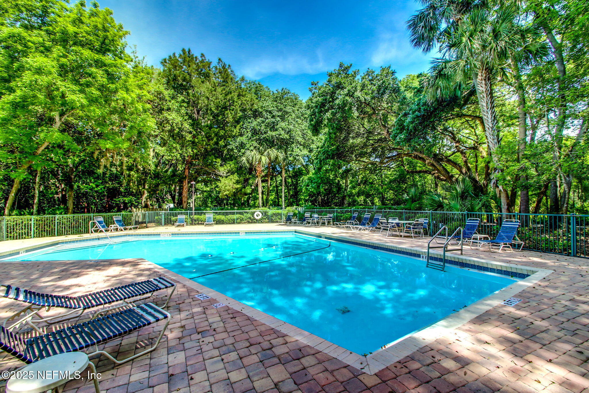 3028 Sea Marsh Road Fernandina Beach, FL 32034 - Photo 26 of 39 a view of a swimming pool with a yard