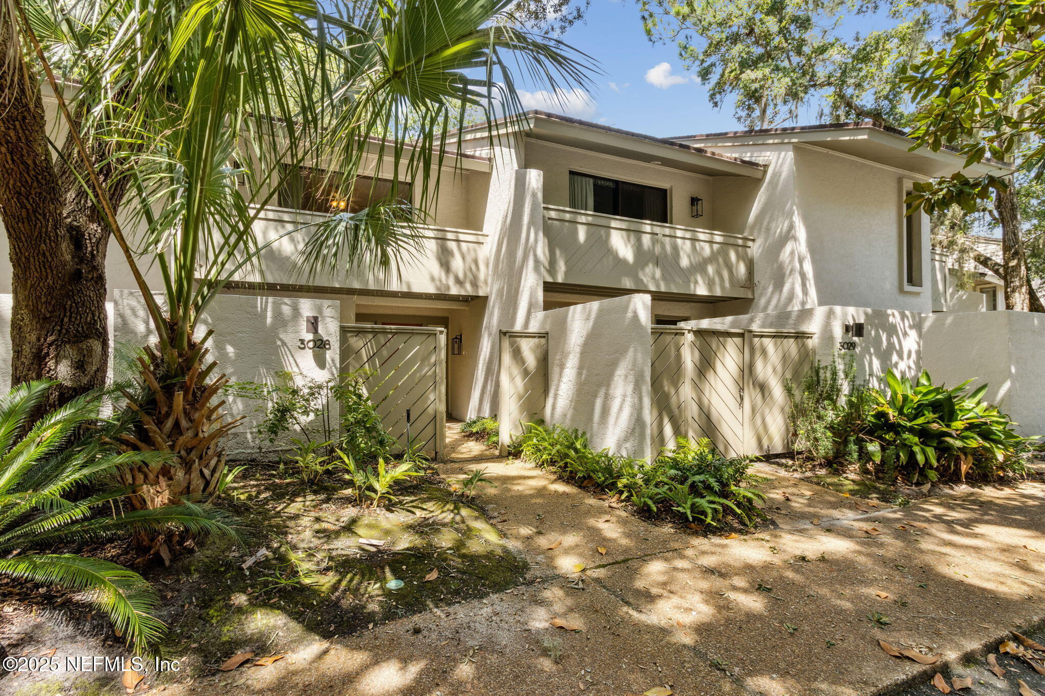 3028 Sea Marsh Road Fernandina Beach, FL 32034 - Photo 5 of 39 a view of a house with a yard