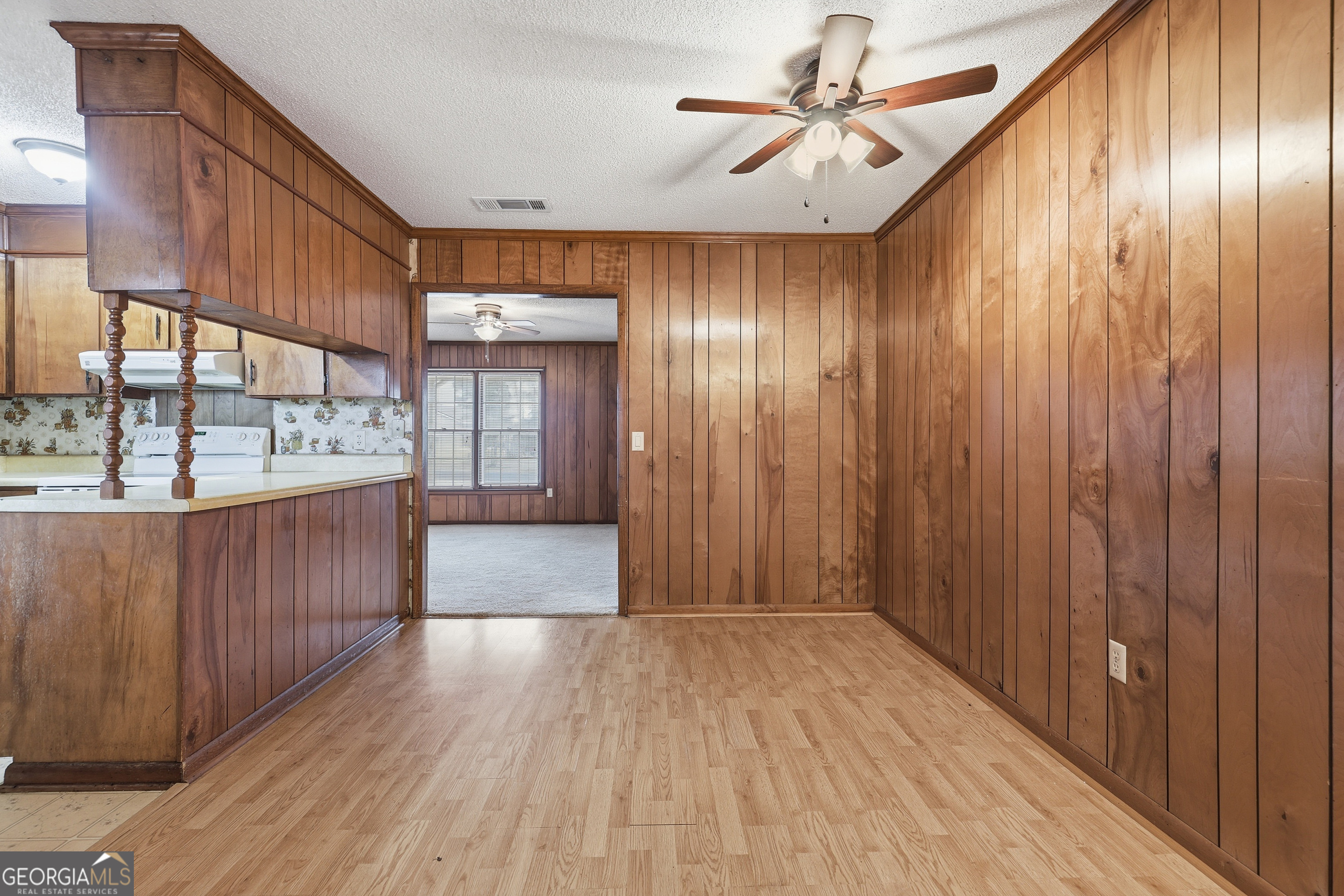 4 Forest Avenue Portal, GA 30450 - Photo 14 of 23 a view of a hallway with wooden floor and entryway
