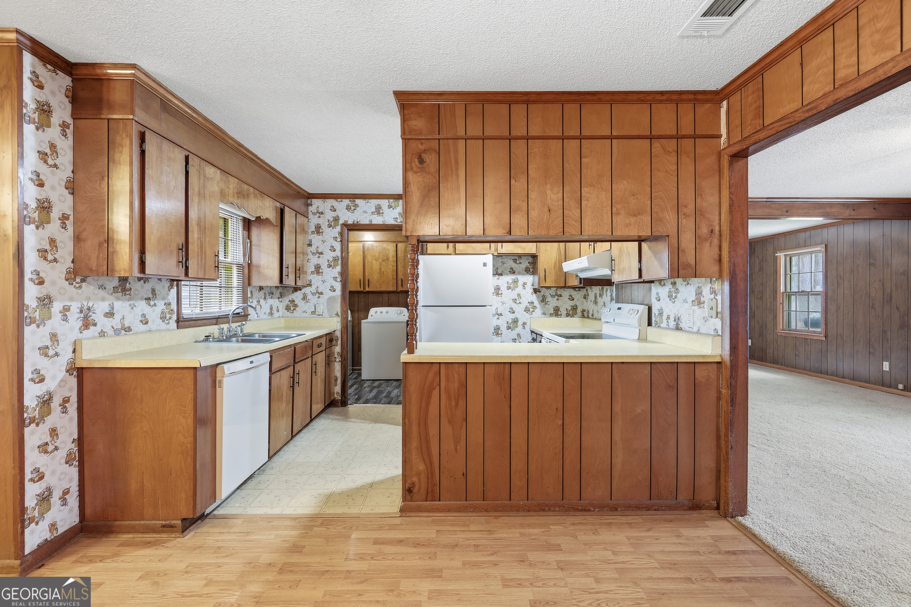4 Forest Avenue Portal, GA 30450 - Photo 15 of 23 a bathroom with a double vanity sink mirror and shower