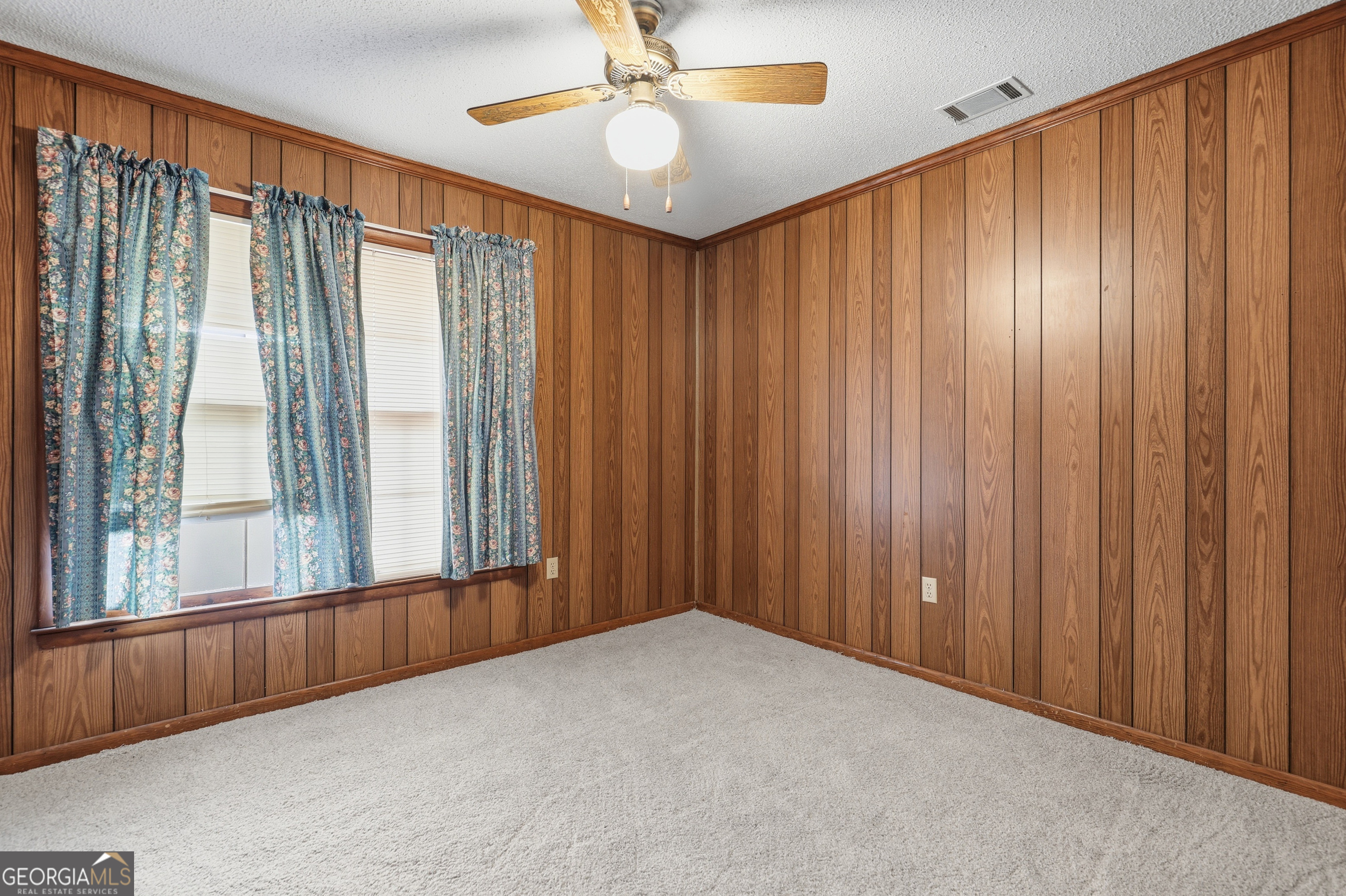 4 Forest Avenue Portal, GA 30450 - Photo 17 of 23 a view of an empty room with a window