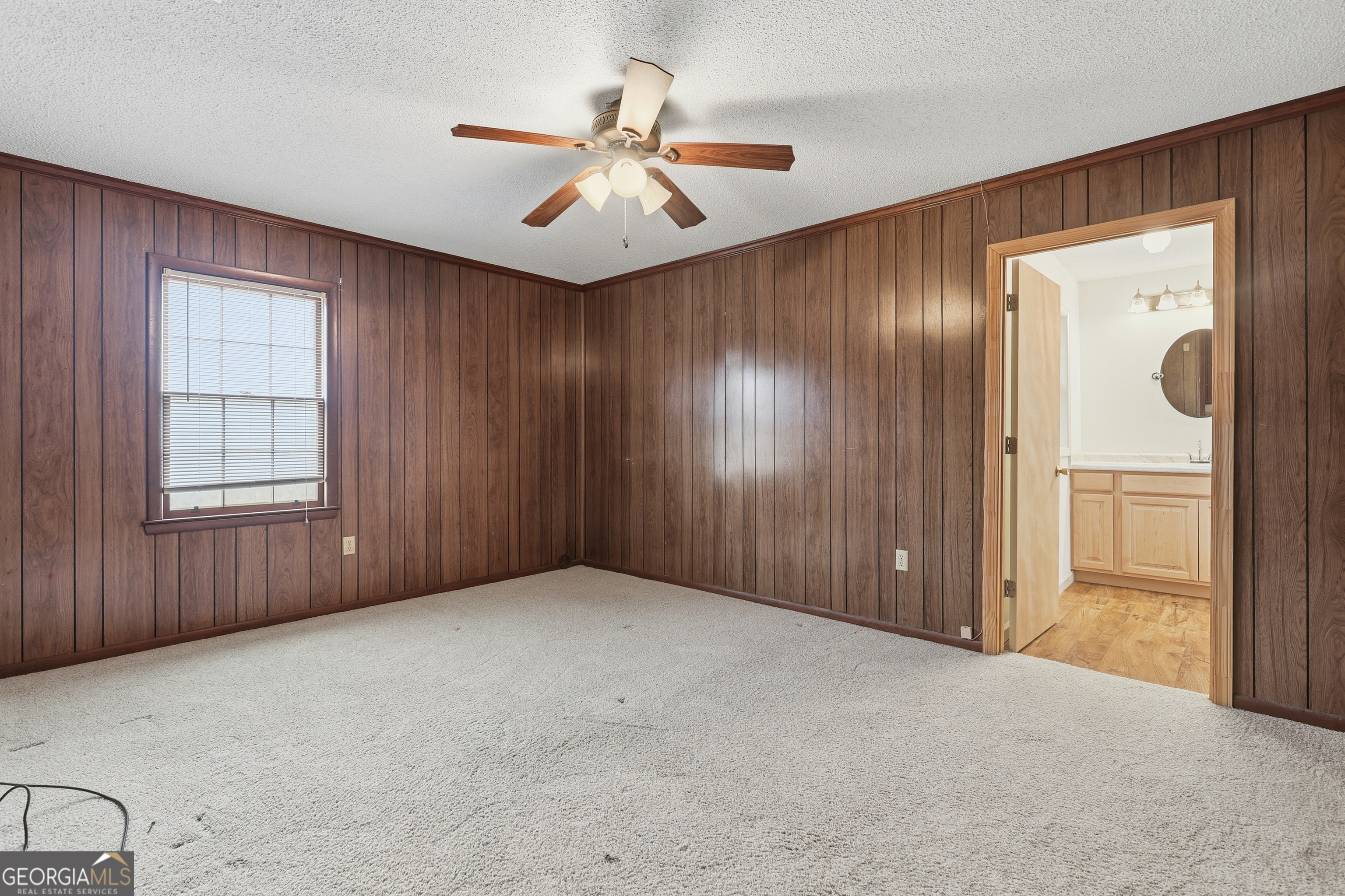4 Forest Avenue Portal, GA 30450 - Photo 19 of 23 a view of an empty room with a window