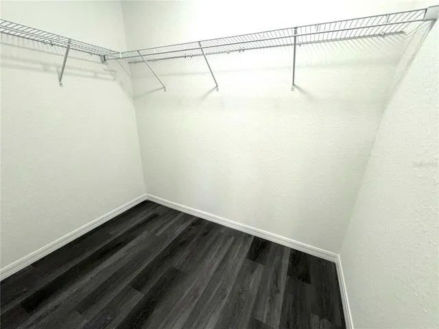 a view of a room with racks on the wall