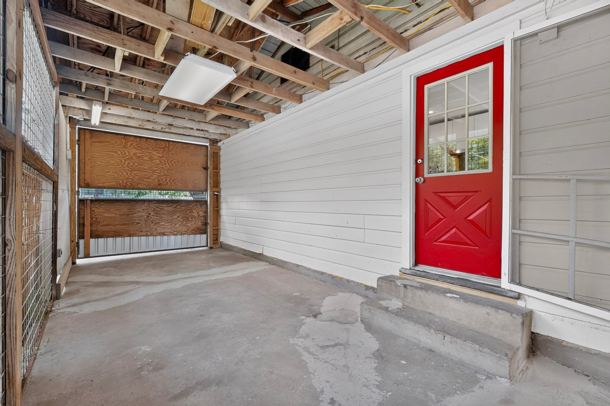 4711 Alf Avenue Austin, TX 78721 - Photo 28 of 34 Carport -- outside door can be opened up