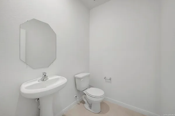 a view of gallery with wooden floor