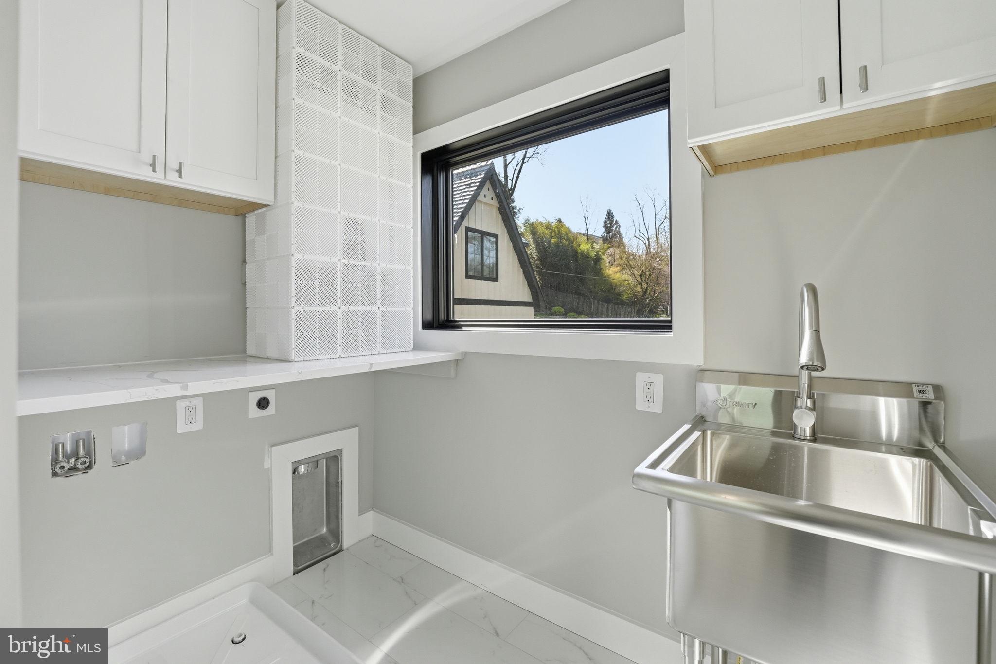 2211 Military Road Arlington, VA 22207 - Photo 39 of 107 Bright and airy laundry space.