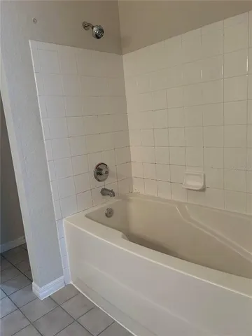 a bathroom with a bathtub