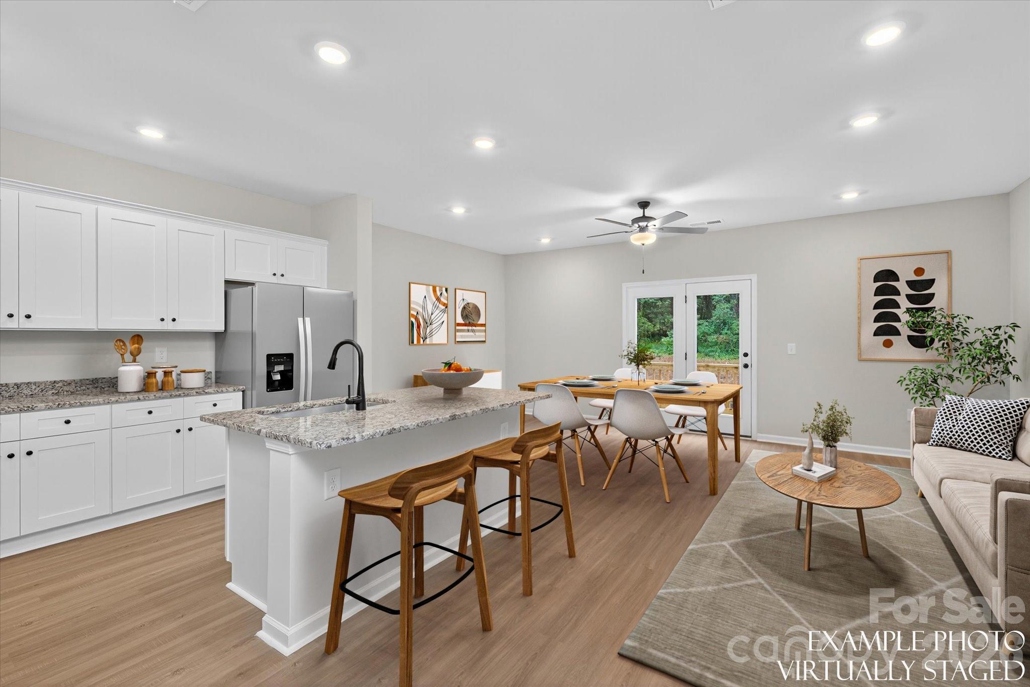 1229 Signal Street Gastonia, NC 28052 - Photo 5 of 14 a view of a dining room with furniture and wooden floor