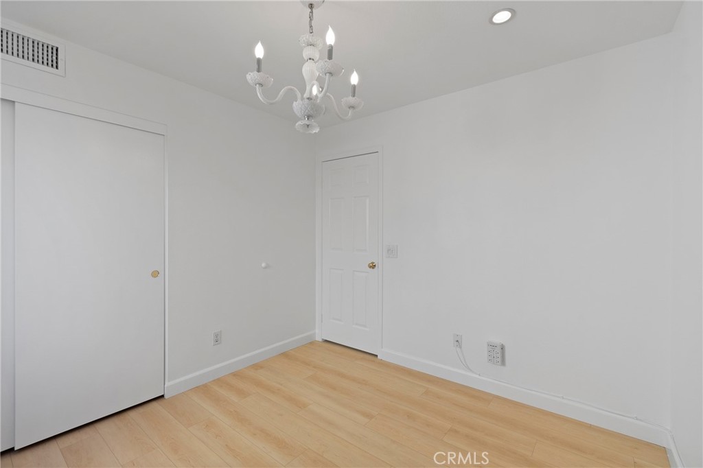 22 Carriage Drive Lake Forest, CA 92610 - Photo 19 of 35 wooden floor in an empty room