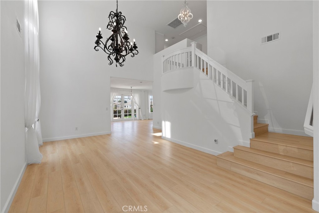 22 Carriage Drive Lake Forest, CA 92610 - Photo 5 of 35 a view of entryway and hall with wooden floor