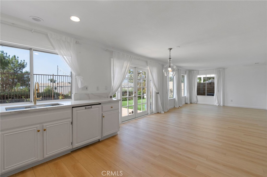 22 Carriage Drive Lake Forest, CA 92610 - Photo 8 of 35 a view of a kitchen with a sink and dish washer