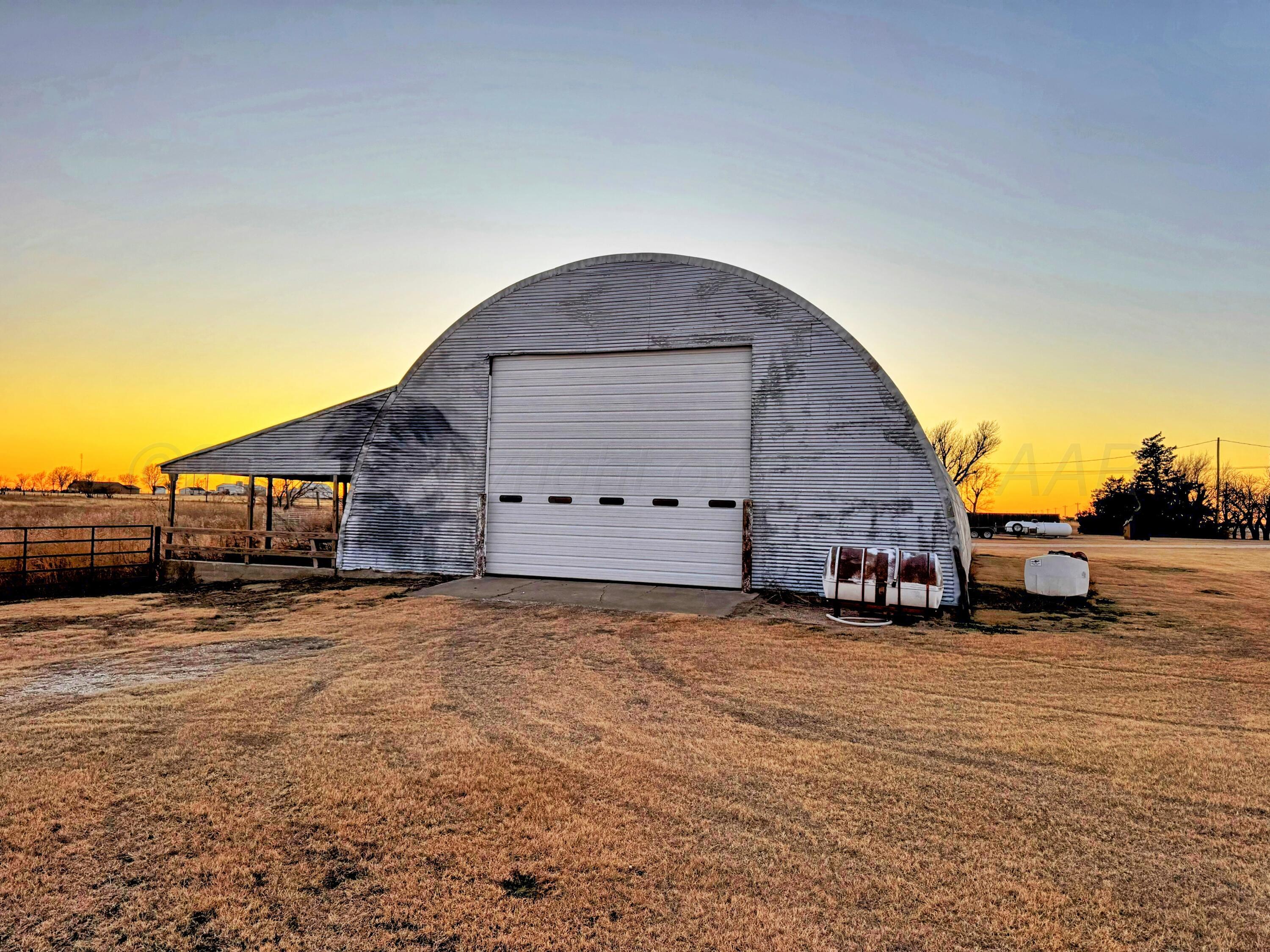 14490 County Road 24 Perryton, TX 79070 - Photo 26 of 28 a view of a house with a yard