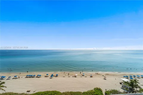 a view of a city with tall buildings