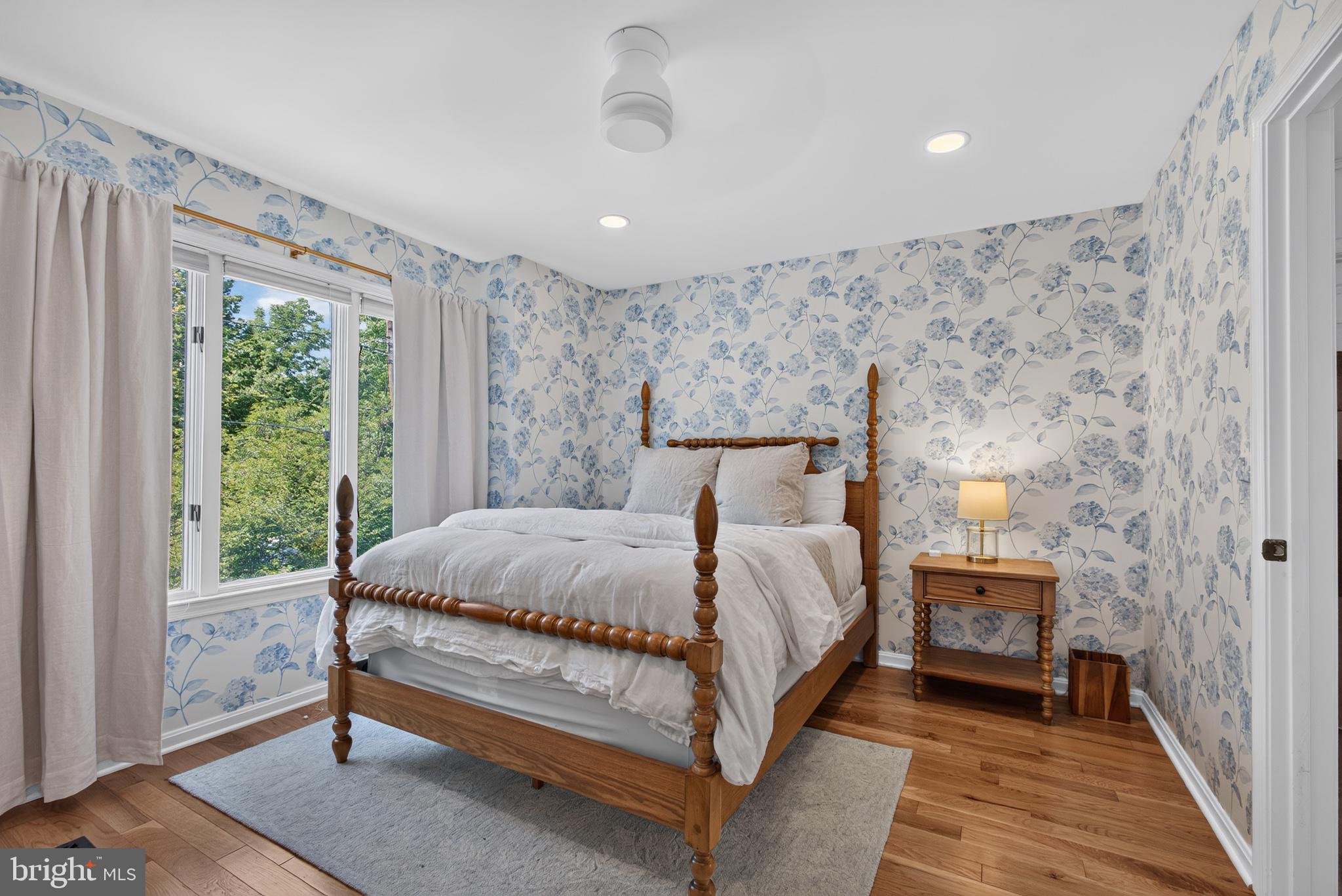 108 Spot Club Road Arnold, MD 21012 - Photo 21 of 30 Charming bedroom with floral accents.