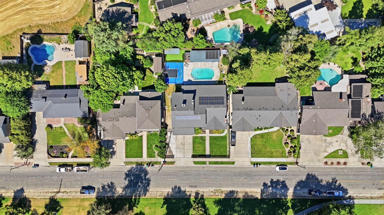 10401 Golf Link Road Turlock, CA 95380 - Photo 53 of 63 an aerial view of multiple houses with a yard