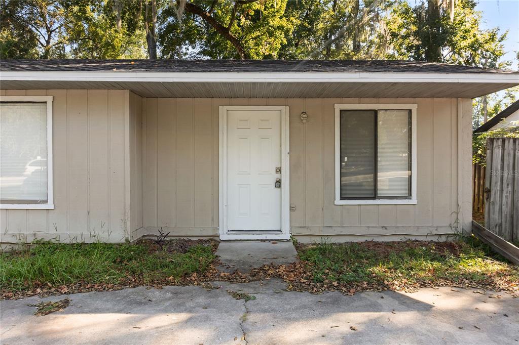 1031 Southwest 61st Street Gainesville, FL 32607 - Photo 1 of 17 a front view of a house